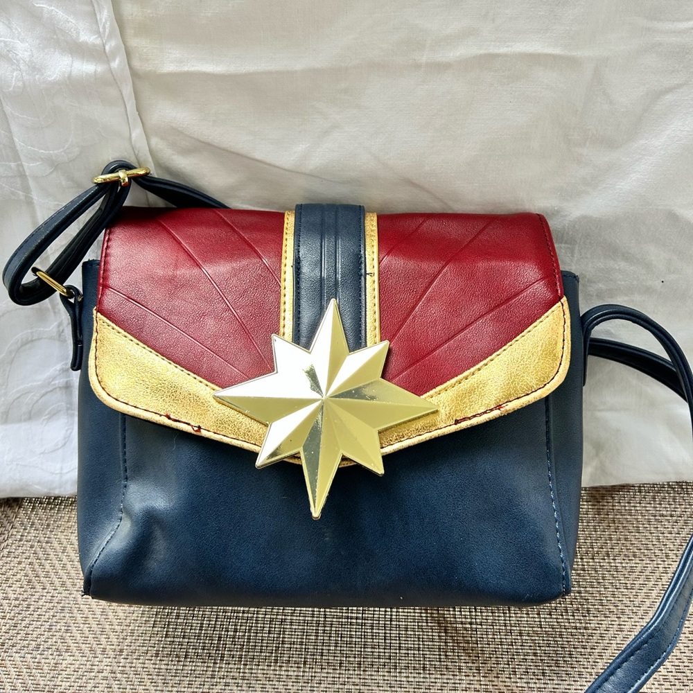 CAPTAIN MARVEL red, blue and gold crossbody bag. Non leather material.